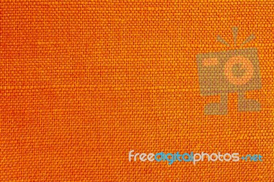 Close Up Of Orange Fabric Texture For Background Stock Photo