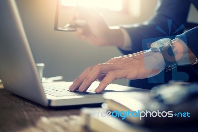 Close Up Of Young Businessman Working Typing On Laptop In Coffee… Stock Photo