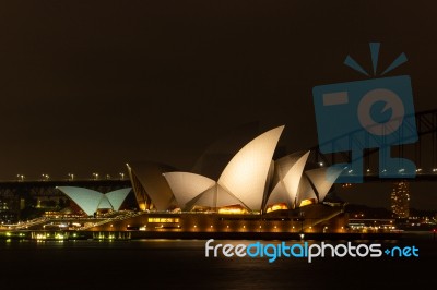 Close Up Opera House In Sydney At Night, Reflection On Harbour View.australia Stock Photo