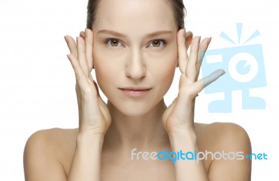 Close-up Portrait Of A Beautiful Young Woman Holding Hands By Her Face Stock Photo
