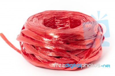 Close Up Red Plastic Rope Top View On White Background Stock Photo