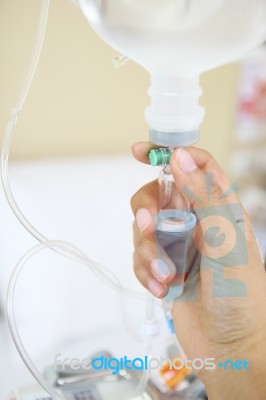 Close Up Saline Iv Drip For Patient And Infusion Pump In Hospita… Stock Photo