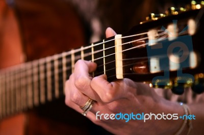 Close Up Woman Guitar Player Stock Photo