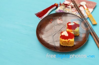 Closeup Egg Sushi On Wooden Plate Stock Photo