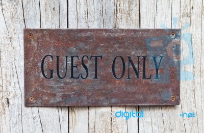 Closeup Guest Only Sign On Wooden Door Stock Photo