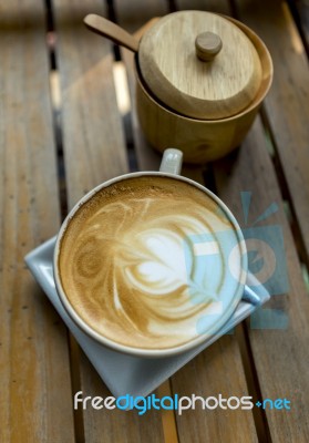 Closeup Hot Latte With Wooden Sugar Bowl Stock Photo