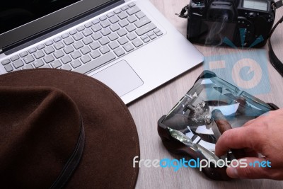 Closeup Of A Wooden Table With Laptop Stock Photo