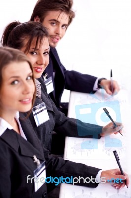 Closeup Of Attractive Business Woman With Colleague Stock Photo