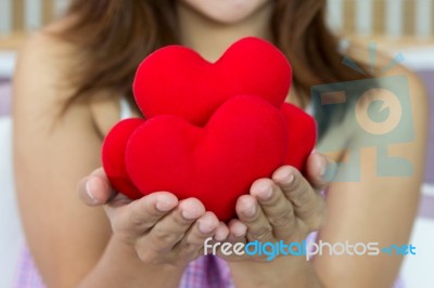 Closeup Women Happiness With Many Heart Shape In Hands Stock Photo