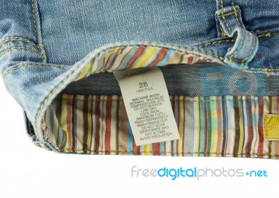 Clothing Label With Laundry Care On Jeans Stock Photo