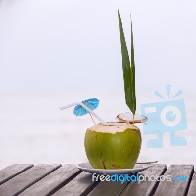 Coconut Water Drink Served In Coconut With Drinking Straw On The… Stock Photo