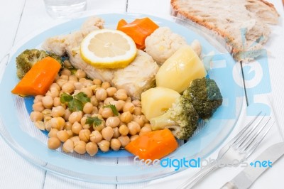 Codfish With Chickpeas And Vegetables Stock Photo