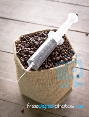 Coffee Bean And Syringe Stock Photo