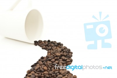 Coffee Beans And Coffee Cup Stock Photo