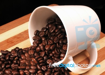 Coffee Beans On A Cup Stock Photo
