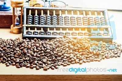 Coffee Beans On A Desk Stock Photo