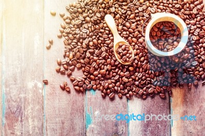 Coffee Beans On A Wooden Stock Photo