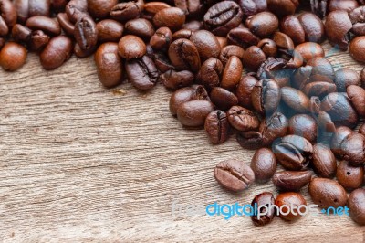 Coffee Beans On The Wooden Floor Stock Photo