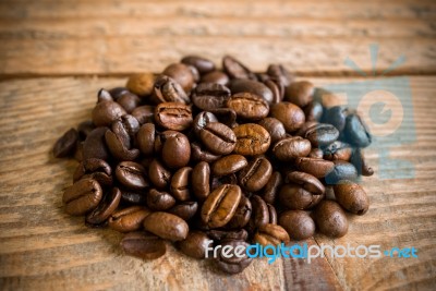 Coffee Beans On Vintage Wood Table Stock Photo