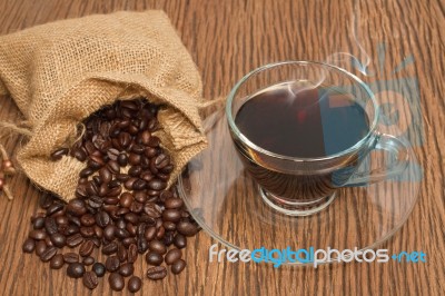Coffee Cup And Coffee Beans Stock Photo