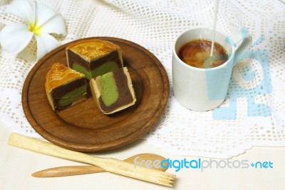 Coffee Cup And Moon Cake Stock Photo