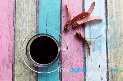 Coffee Cup On Colorful Wooden Panel Stock Photo