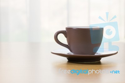 Coffee Cup On Wood Table Stock Photo