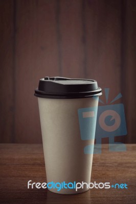 Coffee Cup On Wooden Stock Photo