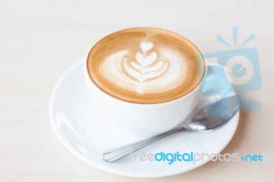 Coffee Cup With Latte Art Stock Photo