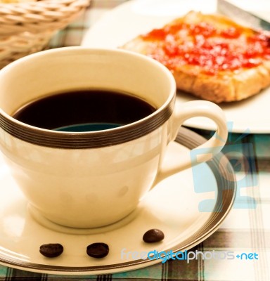 Coffee With Toast Shows Toasted Bread And Breakfast Stock Photo