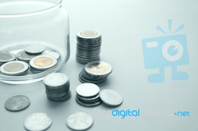 Coins And Glass Jar Stock Photo