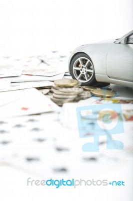 Coins, Cards And A Car Stock Photo