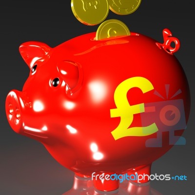 Coins Entering Piggybank Showing British Investing Stock Image