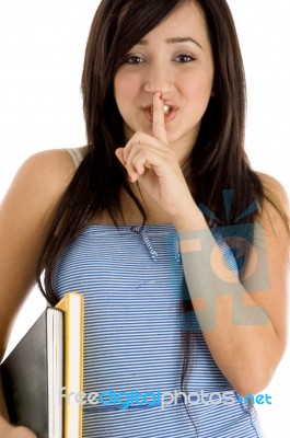 College Girl Showing Silent Gesture Stock Photo