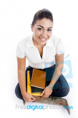 College Girl Sitting With Books Stock Photo