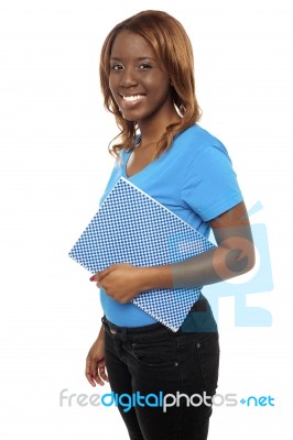 College Student Holding Notebook Stock Photo