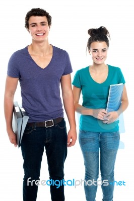 College Student Holding Notebook Stock Photo