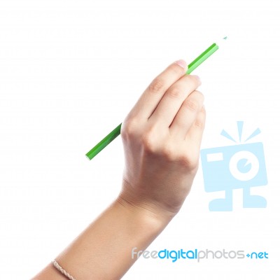 Colored Pencils In A Female Hand On A White Background  Stock Photo