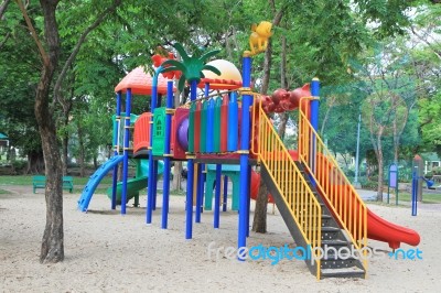 Colorful Children Playground In Green Park Stock Photo