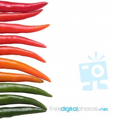 Colorful Chillies Border Isolated On White Background. These Chi… Stock Photo