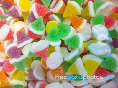 Colorful Cone Shape Jelly Candy Bonbon Snack Group. Sweet For Valentines Day Background. Pastel Color In Red Green Yellow Pink Purple Orange Stock Photo