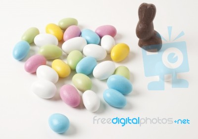 Colorful Easter Almonds And A Bunny Stock Photo