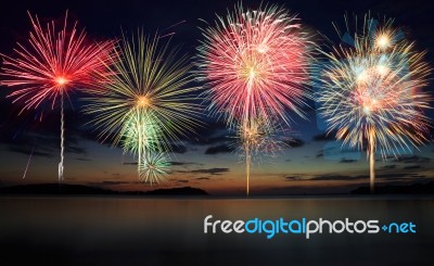 Colorful Fireworks At Beach Stock Photo