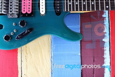 Colorful Guitar And Background Stock Photo
