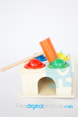 Colorful Hammer Case Wooden Toy On White Table Stock Photo