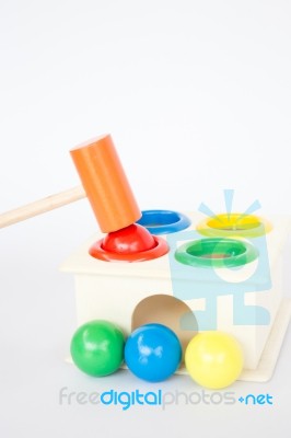 Colorful Hammer Case Wooden Toy On White Table Stock Photo