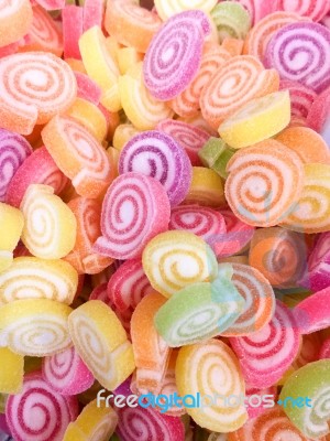 Colorful Jelly Candy Bonbon Snack Group. Sweet For Valentines Day Background. Pastel Color In Green Yellow Pink Purple Orange Stock Photo