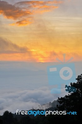 Colorful Sunrise Above The Clouds Stock Photo