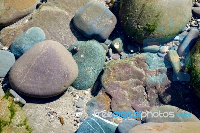 Coloured Rocks In A Saltwater Pool At Bude Stock Photo