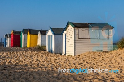 Colourful Beach Huts At Southwold Stock Photo